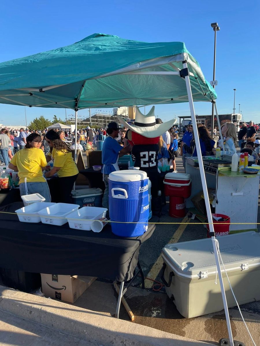Behind the booth during a busy event