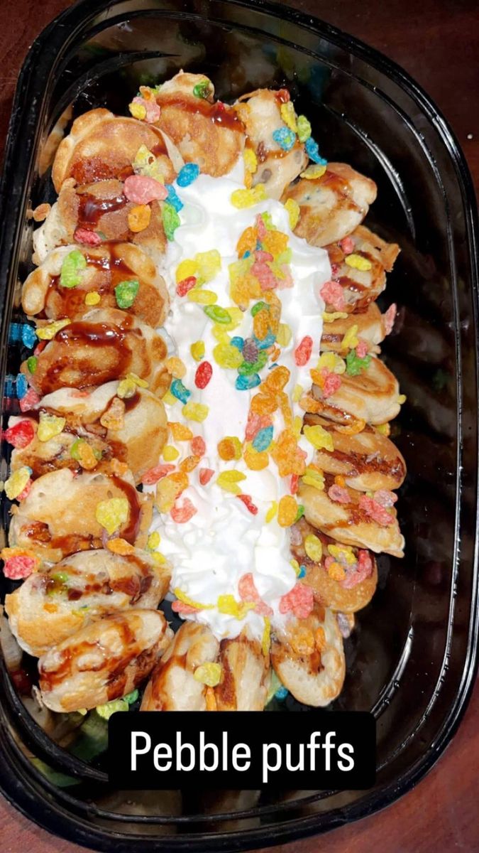 Pebble Puffs: fruity pebbles stuffed mini pancakes with chocolate syrup and whipped cream