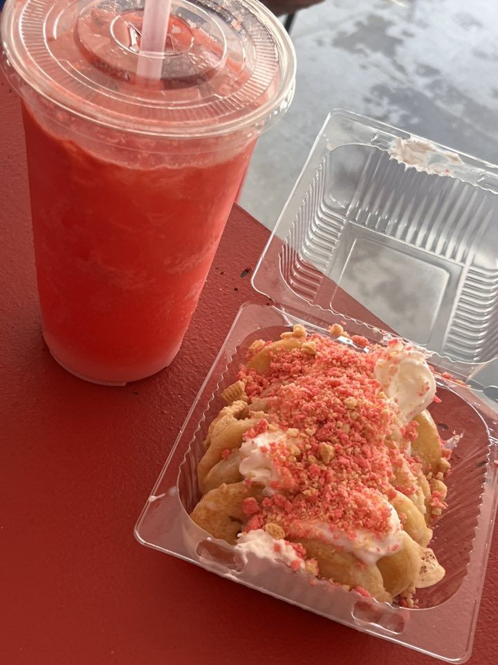 Pink crumble mini pancakes with a matching strawberry drink
